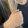 Pan figaroarmbånd med rund plate med piler i forgylt sølv