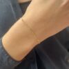 Armbånd i forgylt sølv med med blanke rør