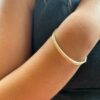 Coeur de Lion armring i gullfarget stål med blanke krystaller