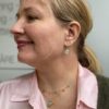 Susanne Friis Bjørner kjede i forgylt sølv med Lys blå krystall og c.zirkonia
