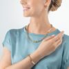 Coeur de Lion «Shape Shifter» armbånd av gullfarget stål og ferskvannsperler