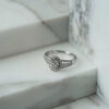 Rosettring oval i hvitt gull med diamanter 0,50 ct