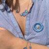 Georg Jensen “Daisy armbånd" i sølv med blå emaljert blomst