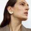 Georg Jensen “Daisy hoops" i forgylt sølv med hvit emalje