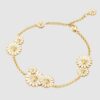Georg Jensen “Daisy layered armbånd" i sølv med 9 hvite emaljerte blomster