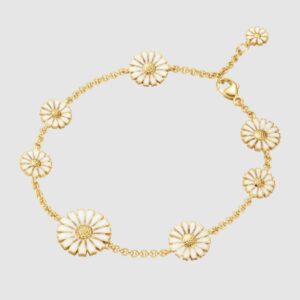 Georg Jensen “Daisy armbånd" i forgylt sølv med 8 hvite emaljerte blomster