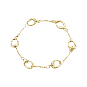 En lekent armbånd i tynn rund anker mønster med Offspring ledd spredt rundt i lenken. Elegant lås som ligner på leddene. Laget i 750 gult gull fra Georg Jensen.