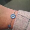 Georg Jensen “Daisy armbånd" i sølv med blå emaljerte blomster