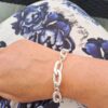 Armbånd i sølv, med hamrede ovale ledd