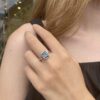 Hvitt gull ring med London blå topas og diamanter 0,14 ct