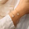Funky stars armbånd i 18 k gult gull med diamanter,