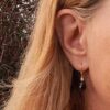 Susanne Friis Bjørner ørepynt, forgylt sølv med topas og røkkvarts