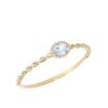 "Aqua" ring i gult gull med topas