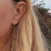 Susanne Friis Bjørner balanseørepynt i forgylt sølv med dråpeformet London blå krystall