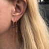 Susanne Friis Bjørner ørering vridd i forgylt sølv med ametyst