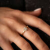 Rosett ring i gult gull med 0,15 ct