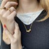 Ulrikke Vogt "Bud Floret triple" armbånd i forgylt sølv med ferskenfarget/ blush månesten og perle