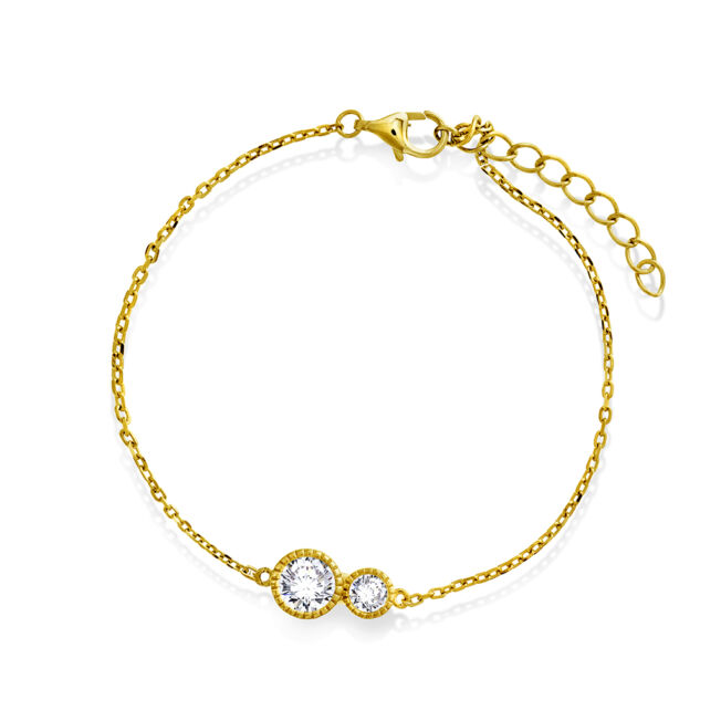 Armbånd fra Nora Mørk by Gulldia. Forgylt sølv med 2 c.zirkonia i ulik størrelse.