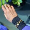 Susanne Friis Bjørner armbånd i forgylt sølv med ledd i irregulær form