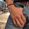 Armbånd med av sort agat og tigerøye med stål pynt