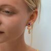OLE LYNGGAARD COPENHAGEN  Lotus øreanheng til ørepynt i gult gull med blush månesten