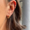 Georg Jensen “Reflect small earhoop" ørering i sølv og gull
