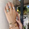 OLE LYNGGAARD COPENHAGEN BoHo ring small i gult gull med akvamarin