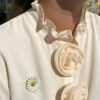 Georg Jensen "Daisy" anheng/brosje med hvit emalje i forgylt sølv