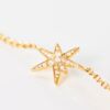 Funky stars armbånd i 18 k gult gull med diamanter,
