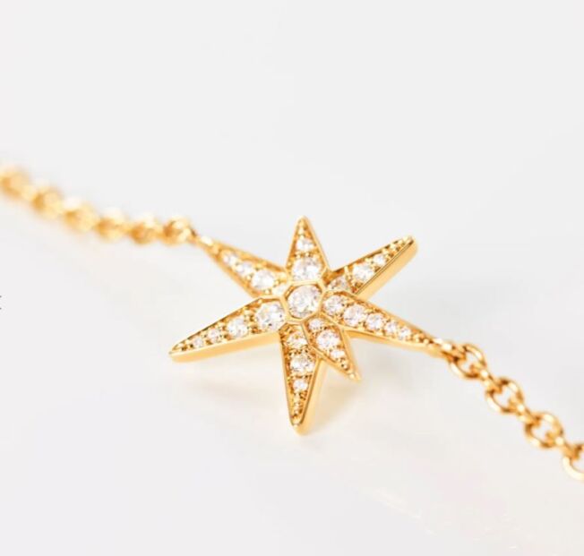 Funky stars armbånd i 18 k gult gull med diamanter,