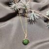 Huldreverket "Seljord" mansjettknapp med peridotgrønn krystall