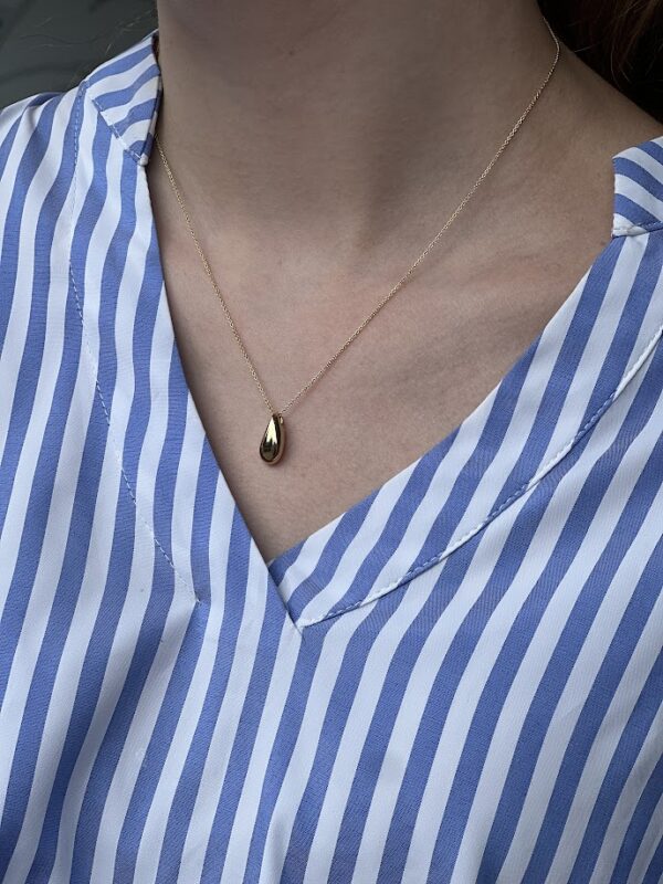 Georg Jensen “Reflect" lite anheng i gull