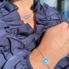 Georg Jensen “Daisy armbånd" i sølv med blå emaljert blomst