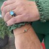 Noën «Stellini» armbånd i gult gull, med diamanter og topas