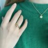 "Fasett" ring i gult gull med 0,20 TW.SI