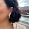 OLE LYNGGAARD COPENHAGEN Shooting Stars studs mini i gult gull