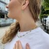 Susanne Friis Bjørner ørering vridd i forgylt sølv med grønn agat