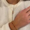 Nora Mørk armbånd med rekangulære ledd med dyporansje c.zirkonia i forgylt sølv