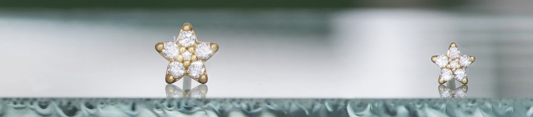 OLE LYNGGAARD COPENHAGEN Shooting star kjede i gult gull lang