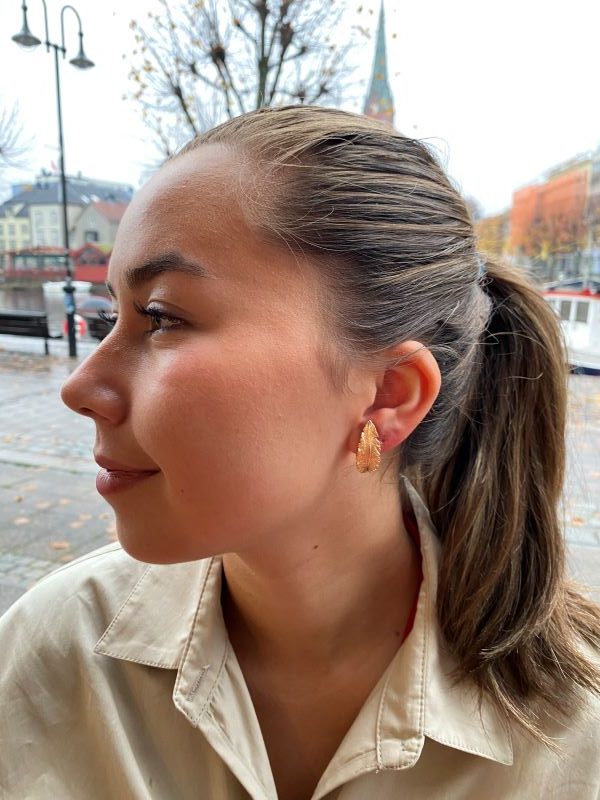 Catwalk Exclusive Stardust Plume ørepynt i forgylt sølv