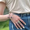 Huldreverket "Tvunnet" armring med Tansanitt og swarovski