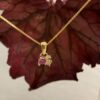 EC 1914 anheng "One of a kind" i gult gull med diamanter i rosa toner
