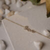 Serenity "Bright Love armbånd" i forgylt sølv med blank c.zirkonia