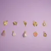 Sandra Lyng Rose glow charm i forgylt sølv med rosenkvarts