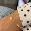 Susanne Friis Bjørner armbånd i forgylt sølv med blomst og mix av sten gul-grønn