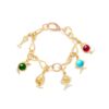 OLE LYNGGAARD COPENHAGEN Bird Family Charm i gult gull med cerise turmalin