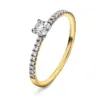 Ring i gult gull med topas og diamanter fattet i skinnen. Perfekt som frierring eller til andre anledninger.