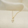 Prins og prinsesse gult gull kors med diamant 0,03 W.P